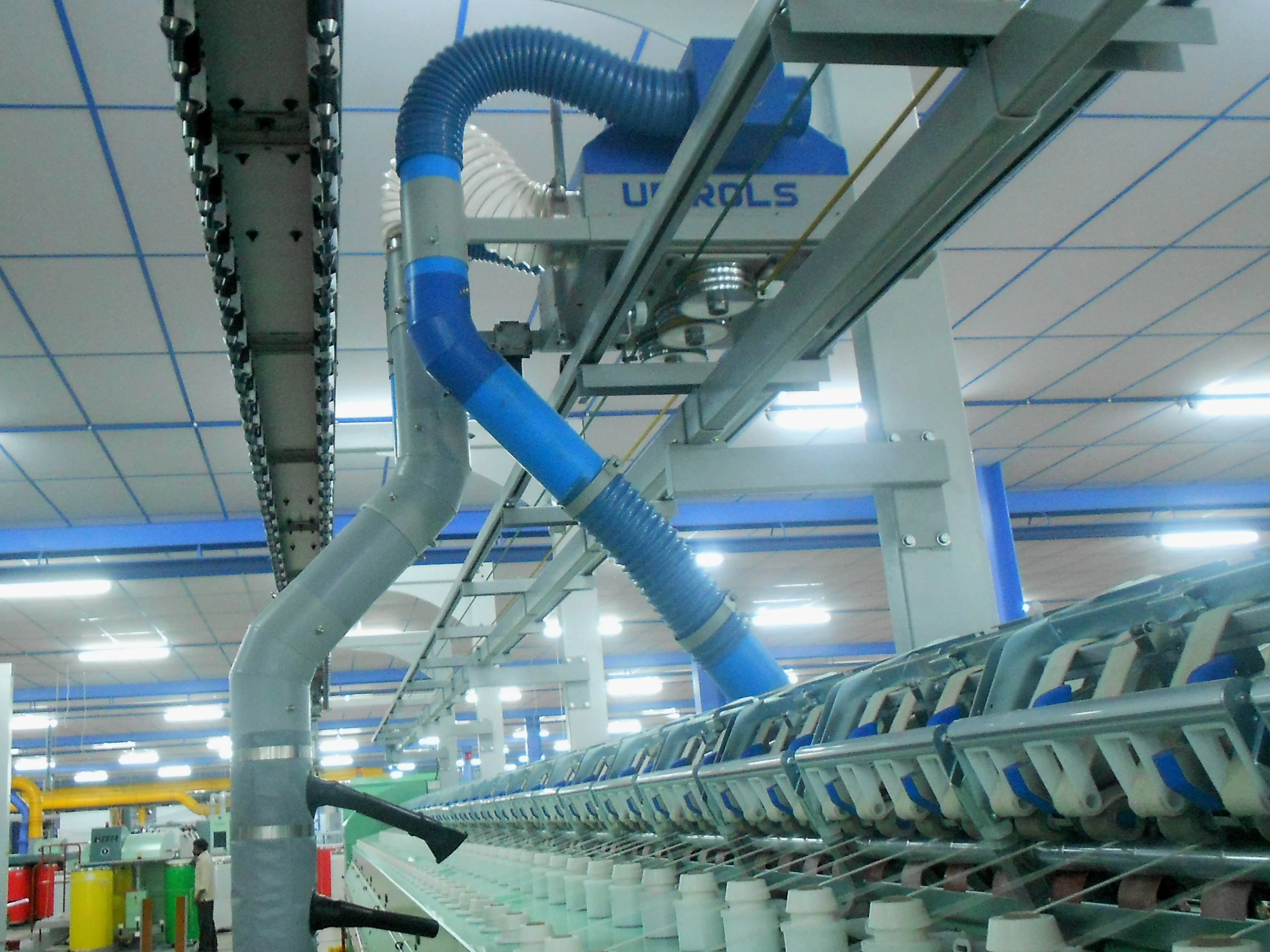 Overhead travelling cleaner - for spinning units - Belt driven travelling cleaner